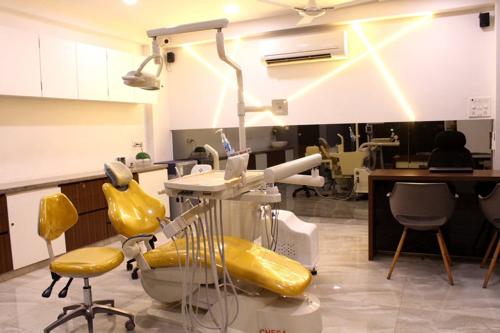 Treatment room with dual dental chairs