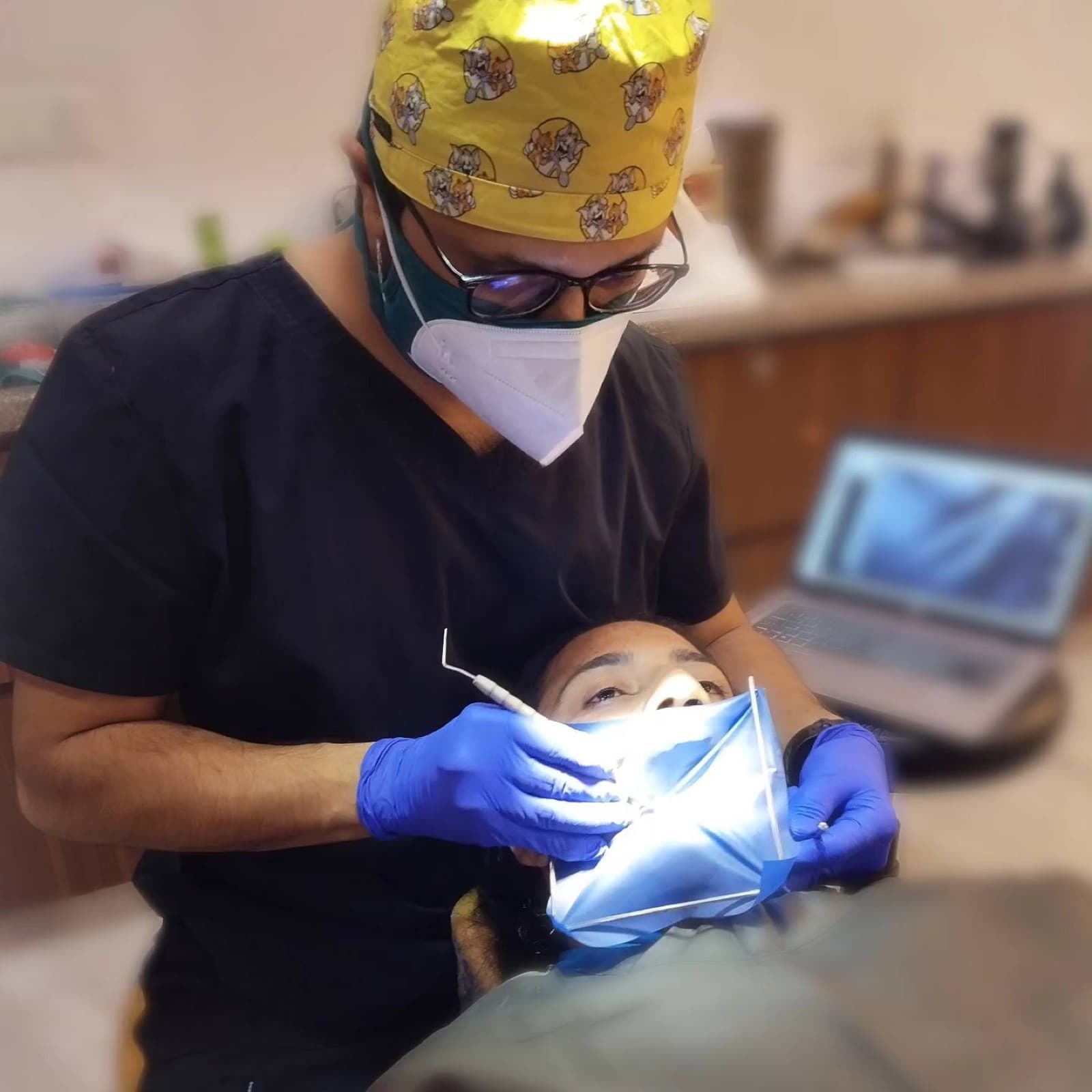Dr. Nihar treating a patient